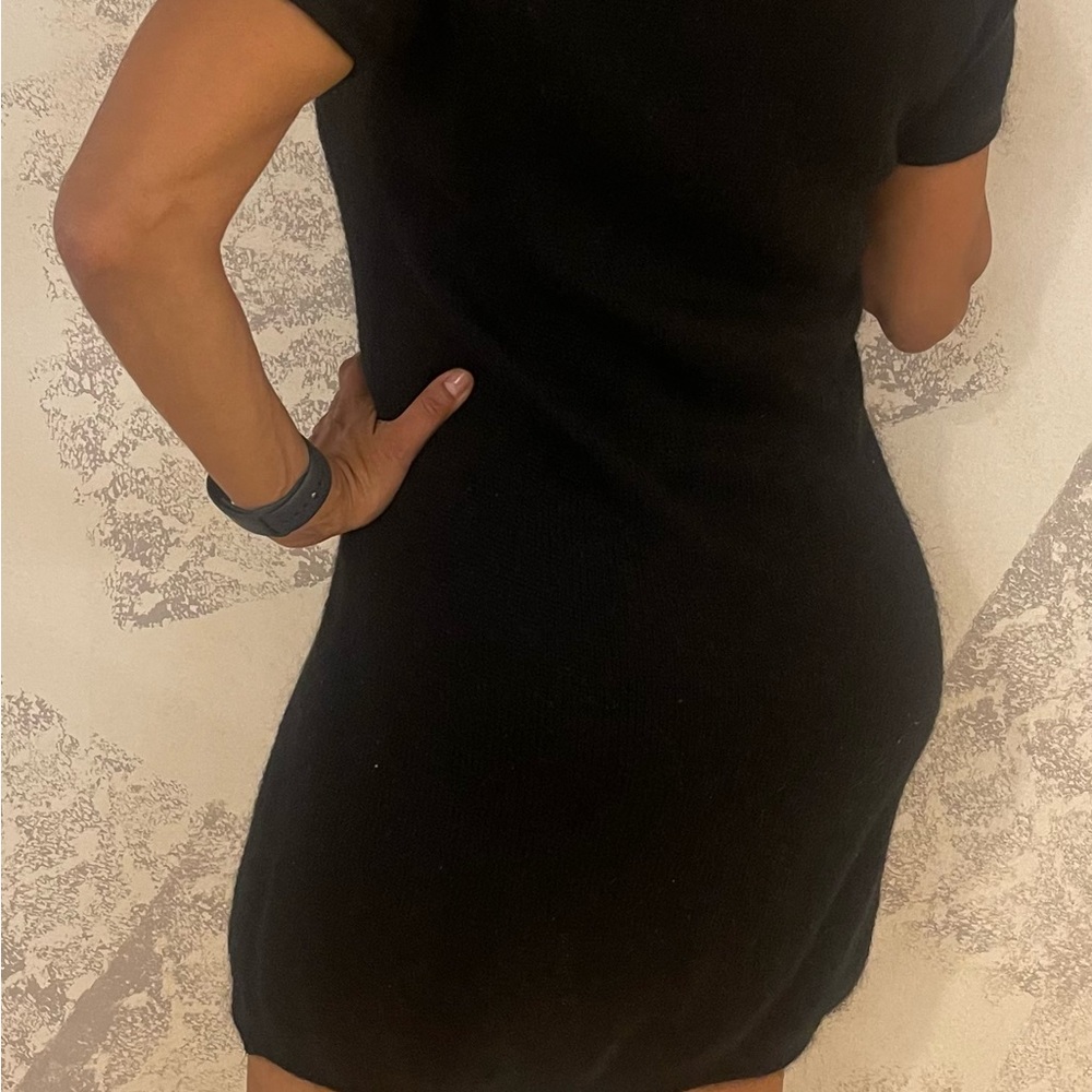 Beneton black dress. Looks great with boots and opaque tights.